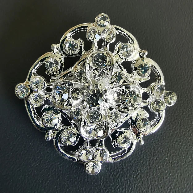 Brosje kuvede linjer (liten)